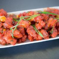 Chili Chicken · Spicy. Slightly battered and deep-fried boneless chicken pieces tossed with onions and chili...