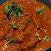 Lamb Rogan Josh Curry - 1 Pint (16 oz) · Kashmiri style dish, lamb chunk cooked with a gravy based on brown onions or shallots, yogur...