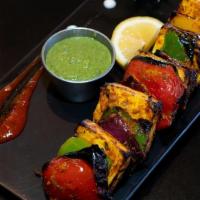 Paneer Tikka Kabab · Vegetarian. Indian cottage cheese squared marinated in the traditiona tandoori mix.