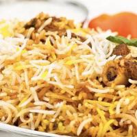 Mutton Dum Biryani (Fri, Sat and Sunday only) - 1/4 Tray · Succulent bone-in goat pieces marinated and slow-cooked with basmati rice in a tightly seale...