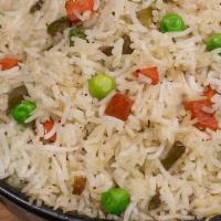 Fried Rice · Steamesd rice stir-fried in a wok with selected option, onion, green chilies, and topped wit...