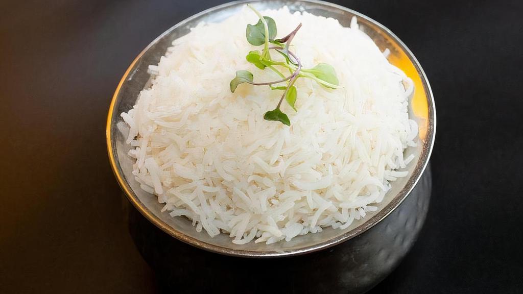 Plain Rice - 1/4 Tray · Steamed basmati rice.