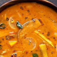 Sambar - 16 oz · A yellow lentil-bashed vegetable stew, cooked with tamarind broth, and seasoned with Indian ...