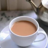 Indian Tea · Tea leaves, cardamon and ginger slow boiled in water and milk and served with sugar on the s...