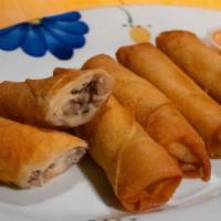 Cheese Lumpia (5) · Fried lumpia stuffed with Swiss cheese, beef, garlic, celery, bean sprouts and green onion. ...