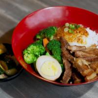 Soy Braised Pork Belly Bowl · A choice of steam rice or noodles - served with broccoli and carrot braised pork sauce fried...