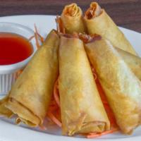 #8. Goong Hom Par (6 Pcs) · Shrimp and ground chicken wrapped with rice paper and deep fried.