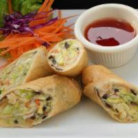 #2. Por Pia Tod (Egg Rolls - 2 Rolls) · Chicken, cabbage, bean noodles wrapped in egg roll skin. And deep fried. (available in veget...