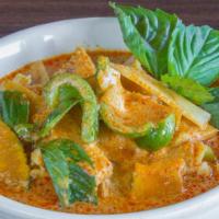 #42. Gang Dang · Red curry with pumpkin, bamboo shoots, bell peppers, basil and coconut milk.