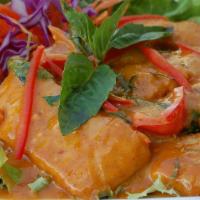 #50. Choo Chee Salmon · Salmon in red curry, coconut milk and kaffir lime leaves.