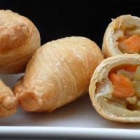 #51. Curry Puff · Deep-fried puff pastry filled with curried potatoes and onion.