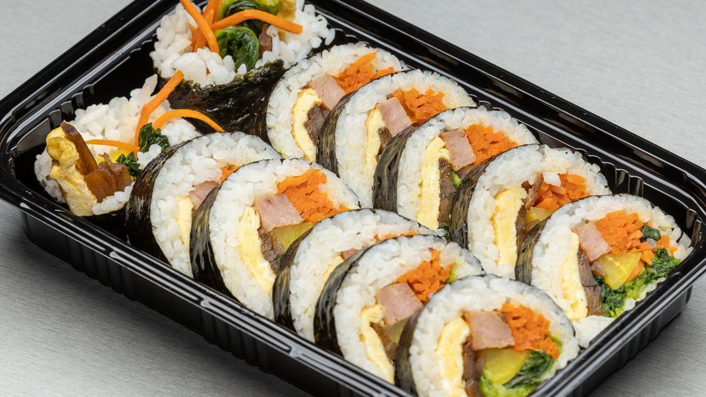 Kimbap · Seaweed, Rice roll with Spam, Egg, Cooked Vegetables.