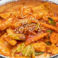 Ddukbokki · Spicy. Koreans' Favorite Hot and Sweet Snack; Stir Braised Rice Cake with Fishcake and Veget...
