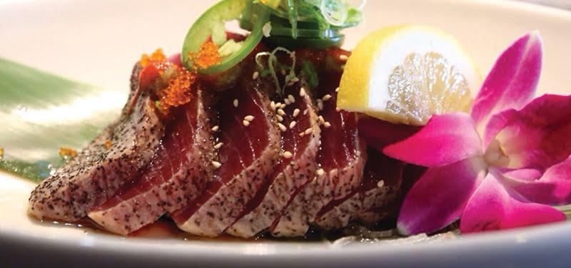 Sea Steak · Thin pepper slice tuna with jalapeño, garlic-yuzu ponzu and green onion.