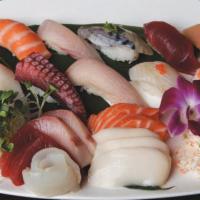 Sushi & Sashimi (Deluxe) · Chef choice of 10 pieces nigiri and 12 pieces sashimi.