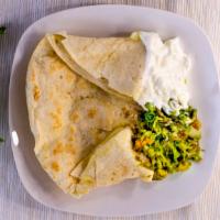 Cheese Quesadilla · A 14” flour tortilla filled with melted cheese, topped with sour cream and guacamole.