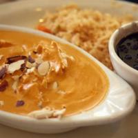 Enjococado (“Great Grandma’s Special”) · 100-year-old family recipe. Sour cream-based sauce with roasted guajillo chiles and special ...