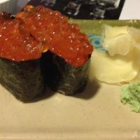 Ikura (Salmon Roe) Sushi · 2 pieces of raw Salmon Roe Sushi.