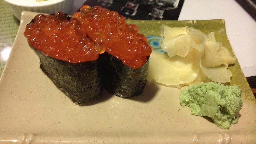 Ikura (Salmon Roe) Sushi · 2 pieces of raw Salmon Roe Sushi.