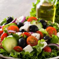 Greek Salad · Romaine hearts, tomatoes, cucumber, red onions, feta cheese, Kalamata olives, lemon juice an...