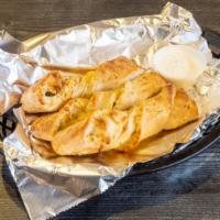Garlic Parmesan Twists (24 Pieces) · Our famous garlic Parmesan twists. Rolled fresh daily and baked to perfection with fresh gar...