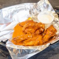 Boneless Wings (24 Pieces) · Enjoy our seasoned boneless wings tossed in your choice of sauce, or none at all, and served...
