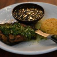 Carne Arrachera · Choice tender steak is specially seasoned flame-broiled and topped with chimichurri sauce. S...