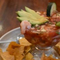 Shrimp Coctel · Mexican style shrimp cocktail. Combination of shrimp, avocado, tomatoes, onions, cucumbers a...