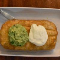 Chimichanga · Deep-fried giant burrito, with your choice of meat, whole beans, Mexican rice, cilantro, sal...
