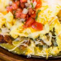 Chile Verde Skillet · Braised pork chile verde, home fries, eggs, pico de gallo and cheese. Served with tortillas.