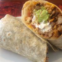 Super Burrito · Large Burrito with your choice of meat and beans, cheese, rice, sour cream, pico de gallo.