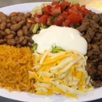 Burrito Bowl · A super burrito without the tortilla. Your choice meat and beans, with lettuce, rice, sour c...