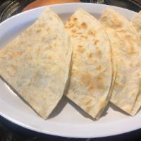 Quesadilla with Meat & Cheese · Large quesadilla filled with cheese and your choice of meat .  With two ounces sour cream on...