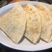 Cheese Quesadilla · Large  quesadilla filled with melted cheese. With two ounces sour cream on side.