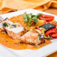 POLLO RELLENO · Marinated airline chicken breast topped traditional mole served with asteca rice