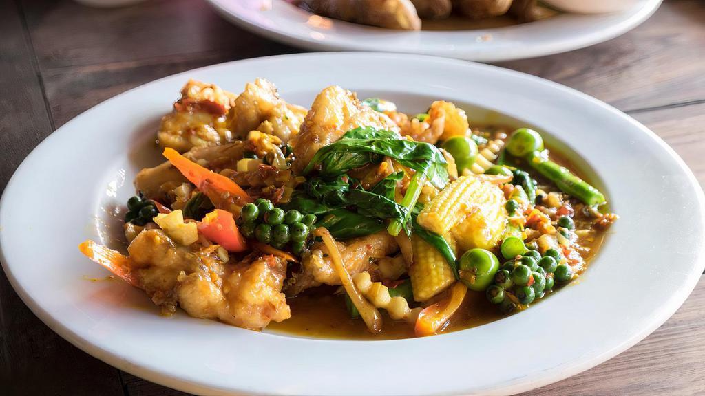 Fish Stir Fry · Sautéed Onions, Garlic, Cilantro, Fish, with Mixed Veggies, made in Tomato sauce and Yemeni spices.