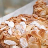 Apple and Almond · A buttery short dough tart shell filled with frangipane and sliced apples baked till tender,...