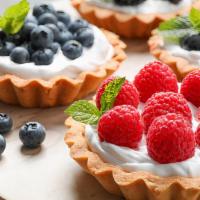 Assorted Fresh Fruit · A butter short dough tart shell filled with creme patissiere and seasonal fresh fruit which ...