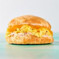 Yee Haw · Fluffy buttermilk biscuit stuffed with egg, cheddar cheese, and country ham aioli