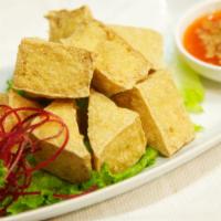 5. Tofu Tod · Vegetarian. Deep-fried tofu served with sweet and sour sauce and ground peanuts.