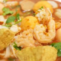 88. Yen Ta Fo Soup · Noodle soup with fish and shrimp balls, tofu, squid, shrimp, spinach, and special sauce. Ser...