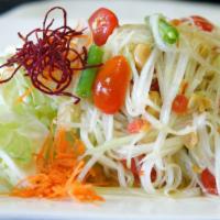 15. Som Tum Thai Salad · Shredded green papaya salad with dried shrimps, tomatoes, green beans, ground peanuts, chili...