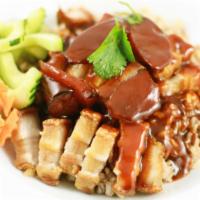 41. Kao Moo Krob · Crispy pork belly and Chinese sausage topped with chef's secret gravy sauce. Also available ...