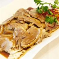 44. Kao Na Ped Pa-Lo · Five spiced duck over rice. Also available a la carte. Add rice, a la carte for an additiona...
