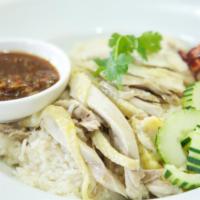 43. Kao Mun Gai · Steamed chicken over garlic rice. Also available a la carte. Add rice, a la carte for an add...