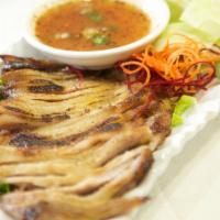 50. Kor Moo Yang · Grill-marinated pork shoulder served with chili sauce.