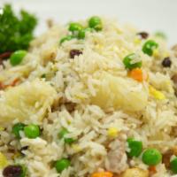 99. Pineapple Fried Rice · Top menu item. Fried rice mixed with pineapple, eggs, cashew nuts, raisins, onions, carrots,...