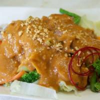 108. Pra-Ram · Your choice of chicken, beef, or pork with mixed vegetables topped with peanut sauce. Add ri...