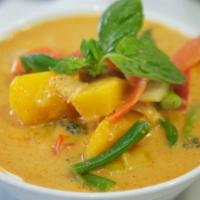 67. Pumpkin Curry · Top menu item. Your choice of chicken, beef, pork, or tofu in medium red curry sauce with pu...
