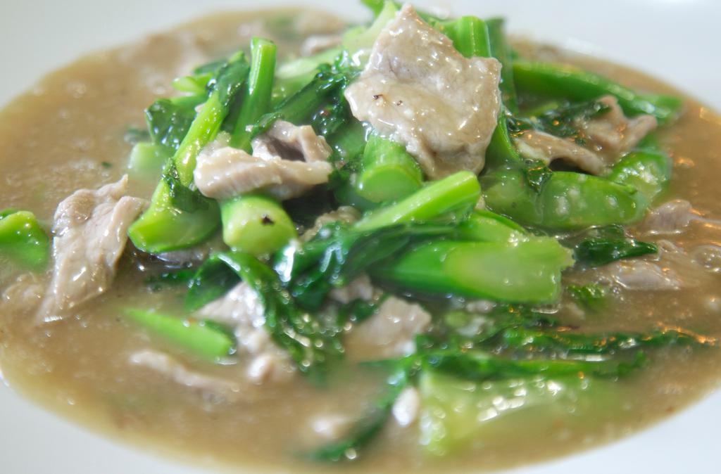 73. Rad Na Noodles · Flat rice noodles topped with your choice of beef, pork, or chicken with Chinese broccoli in gravy.